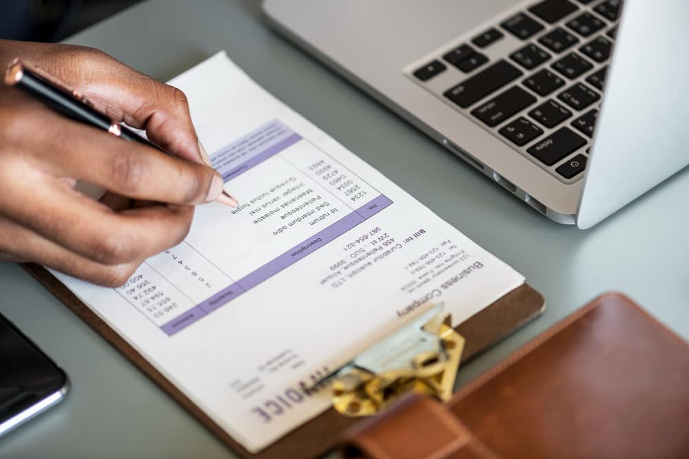 A man signing a bill of sale