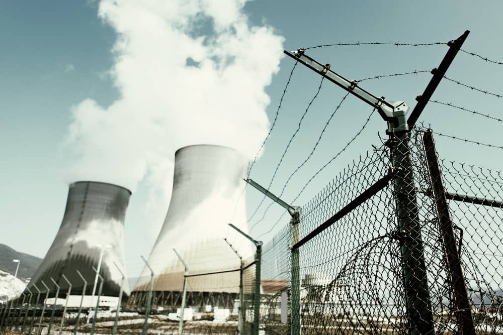 A Chimney releasing smoke in an Energy Infrastructure in the EU